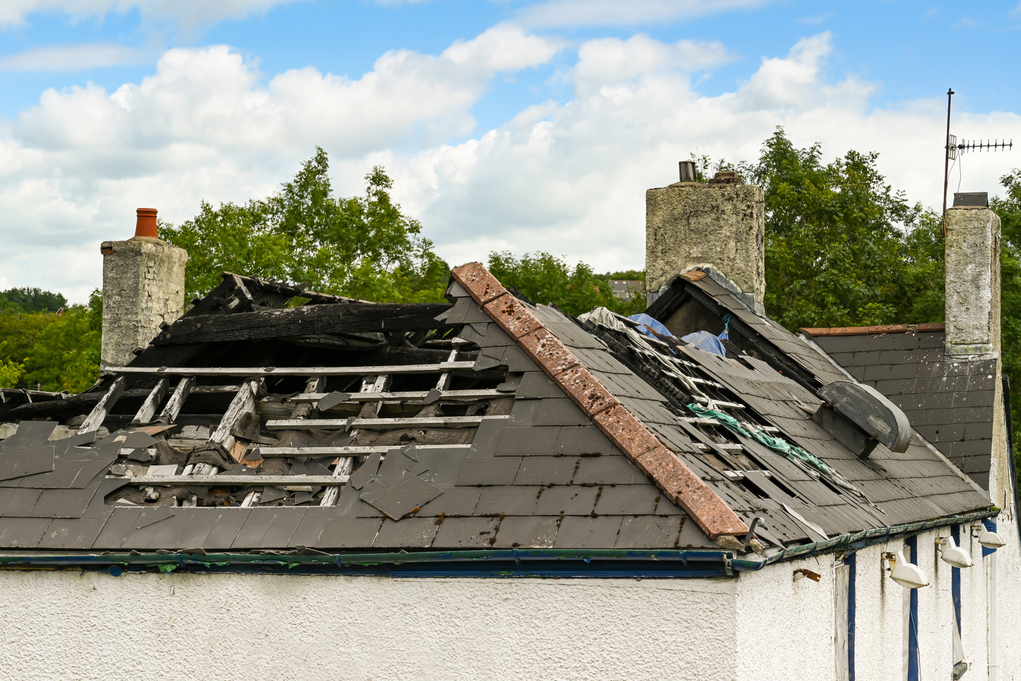 Fire damaged roof of a building.